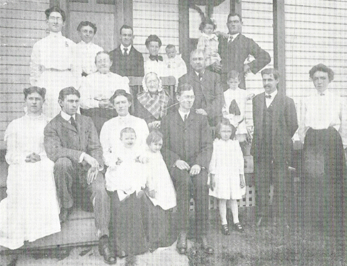 A group of people posing for a photo
Description automatically generated