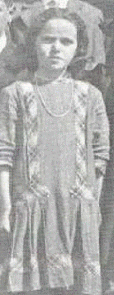 A picture containing text, person, old, standing
Description automatically generated