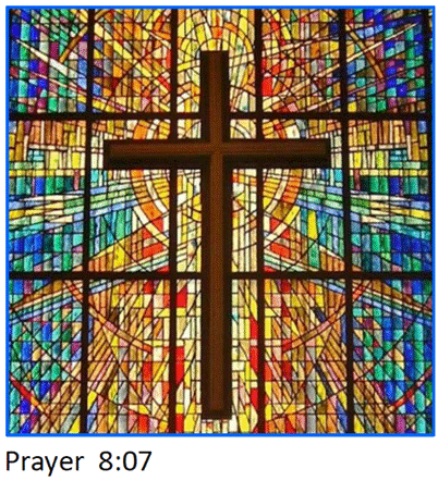 A stained glass window with a cross

Description automatically generated